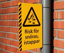 Varningsskylt Snöras och istappar